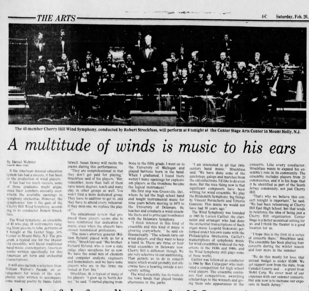 Newspaper clip that features an orchestra